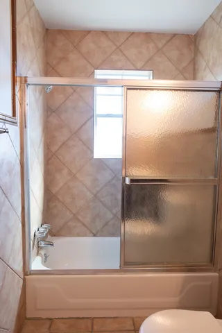 a bathroom with a bathtub