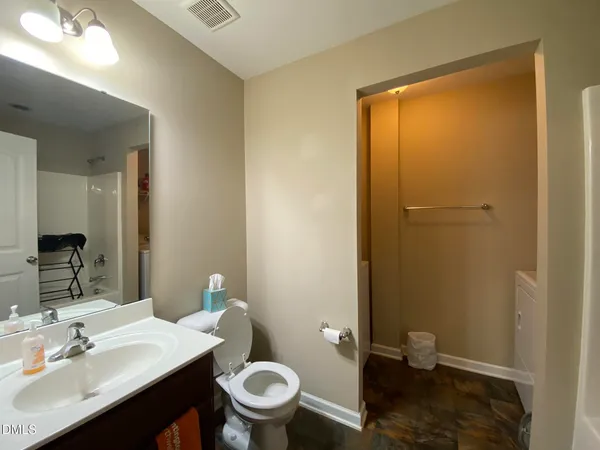 a bathroom with a sink and a toilet