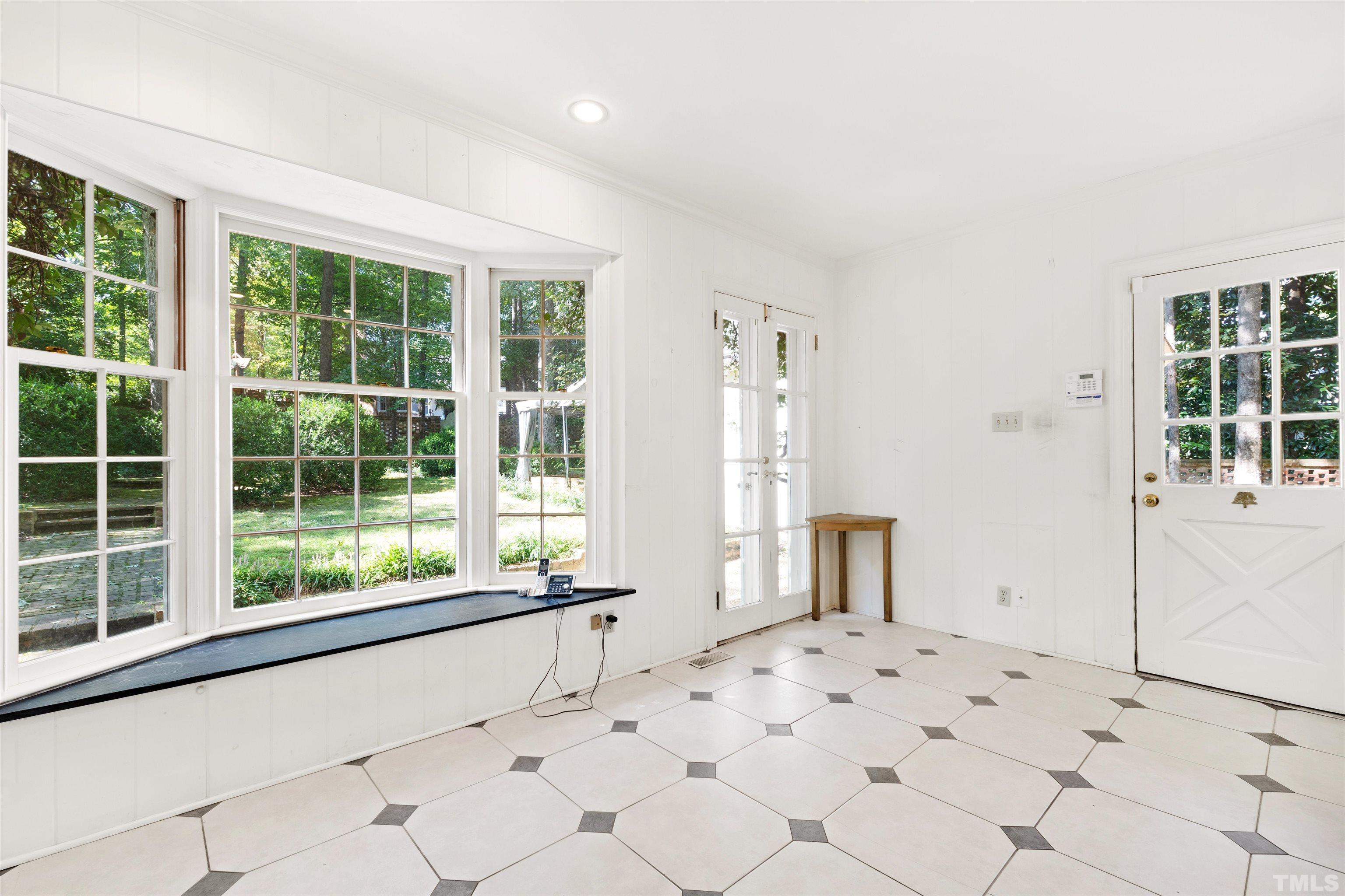 3231 Sussex Road Raleigh, NC 27607 - Photo 16 of 60 a view of empty room with window and refrigerator