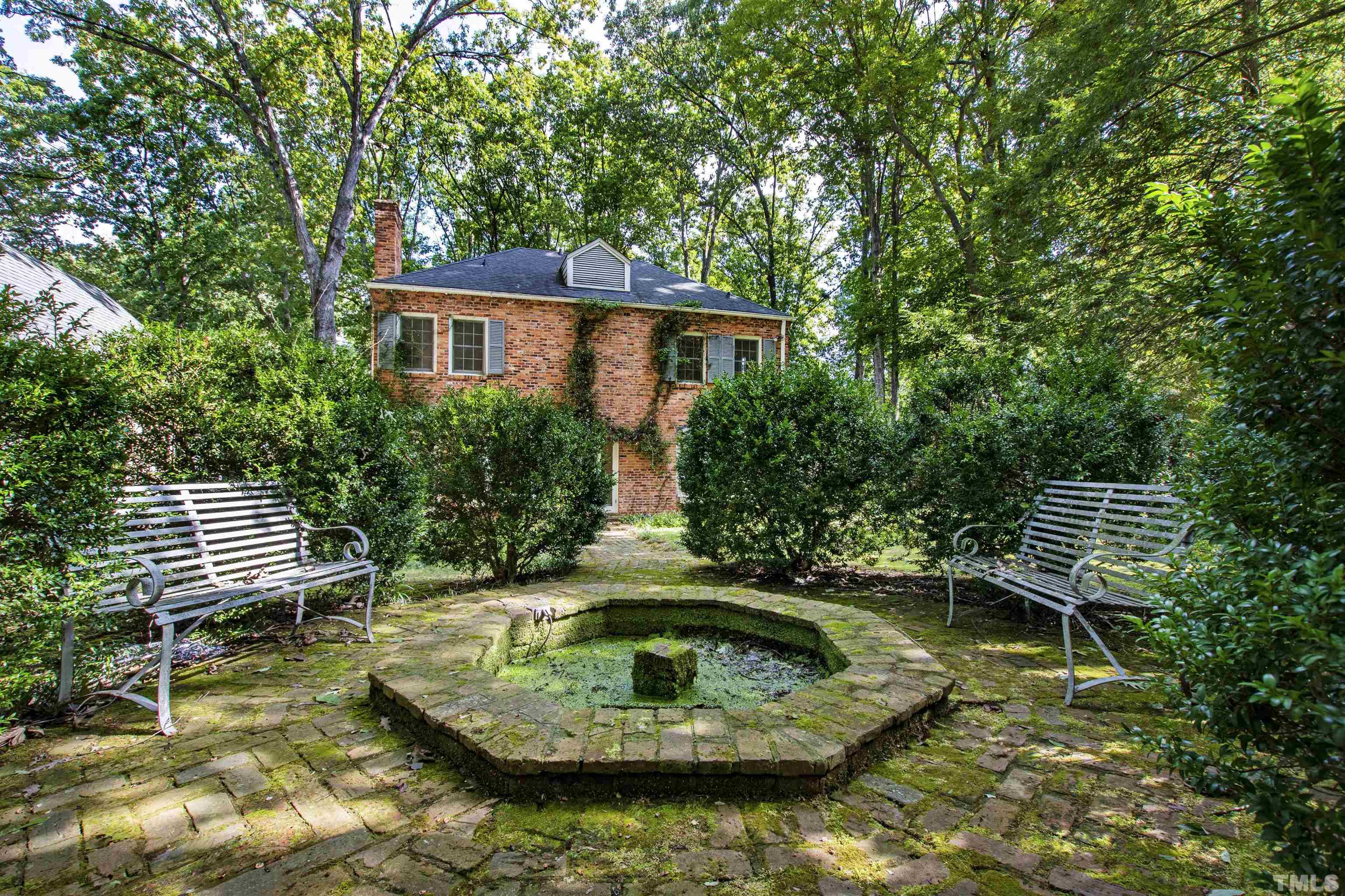 3231 Sussex Road Raleigh, NC 27607 - Photo 39 of 60 a view of a swimming pool with a patio and a yard