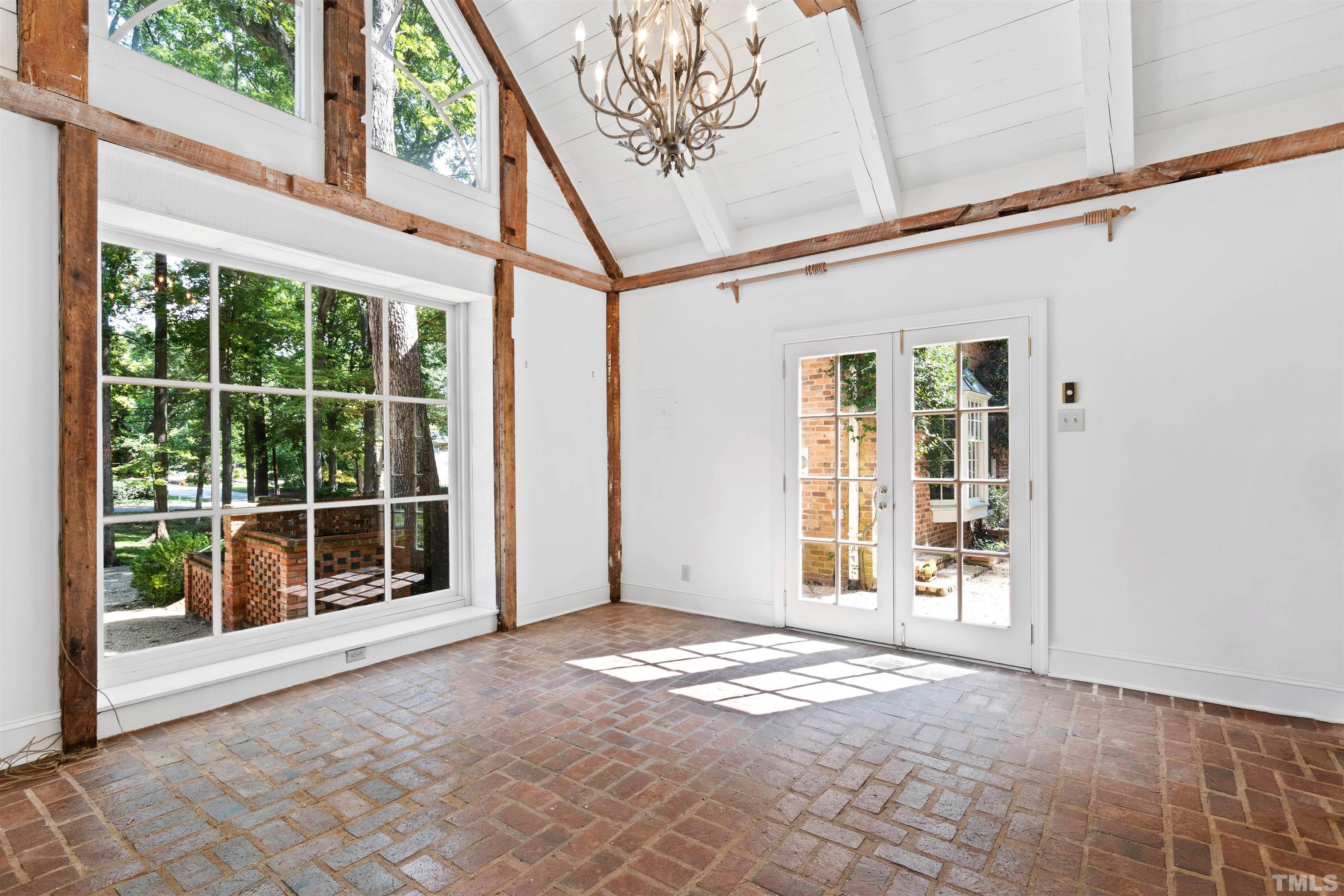3231 Sussex Road Raleigh, NC 27607 - Photo 41 of 60 a view of a large window with an outdoor space