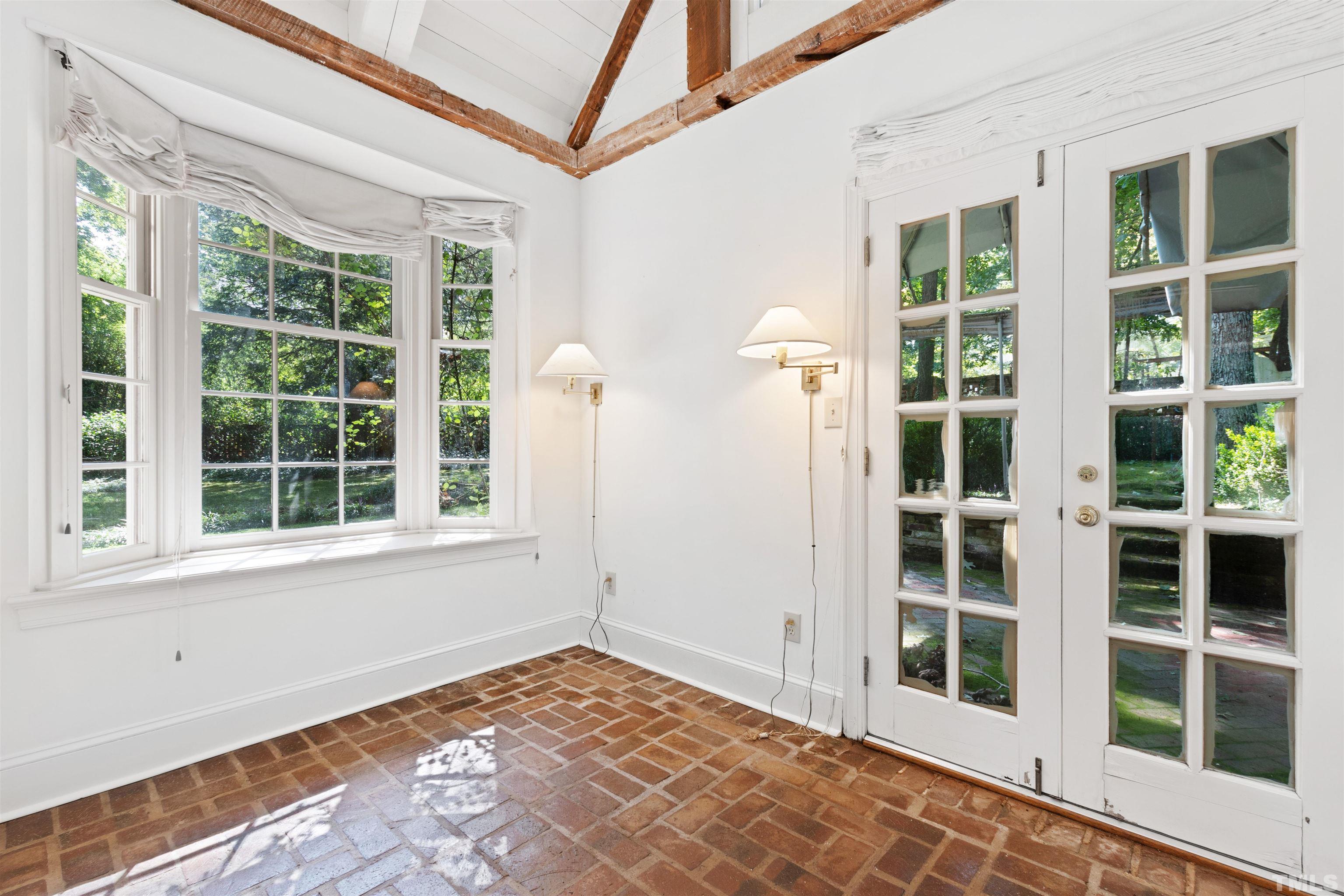 3231 Sussex Road Raleigh, NC 27607 - Photo 45 of 60 a view of an empty room with a window