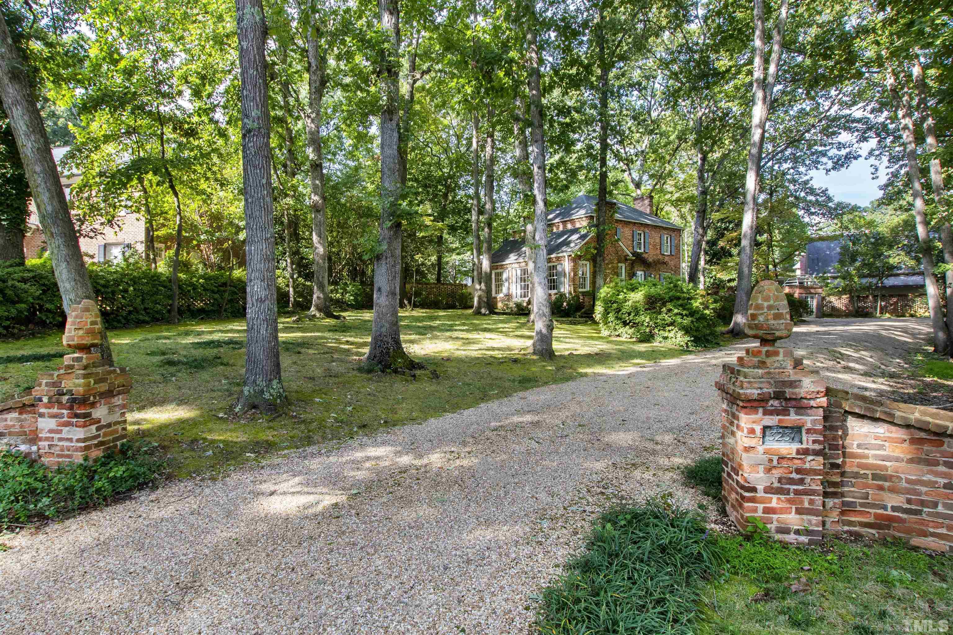 3231 Sussex Road Raleigh, NC 27607 - Photo 51 of 60 a view of a park with tree s