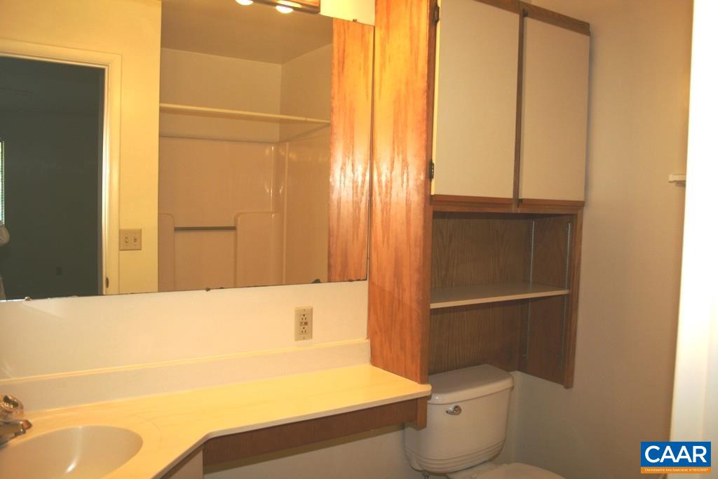 117 Turtle Creek Road, Unit 10 Charlottesville, VA 22901 - Photo 12 of 12 a bathroom with a bathtub and a toilet