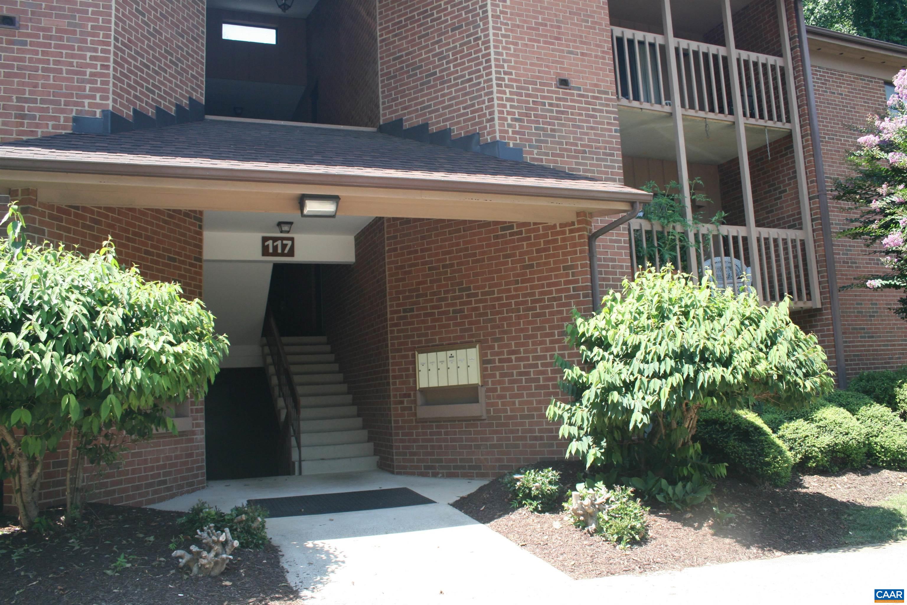 117 Turtle Creek Road, Unit 10 Charlottesville, VA 22901 - Photo 2 of 12 a front view of a house with a yard