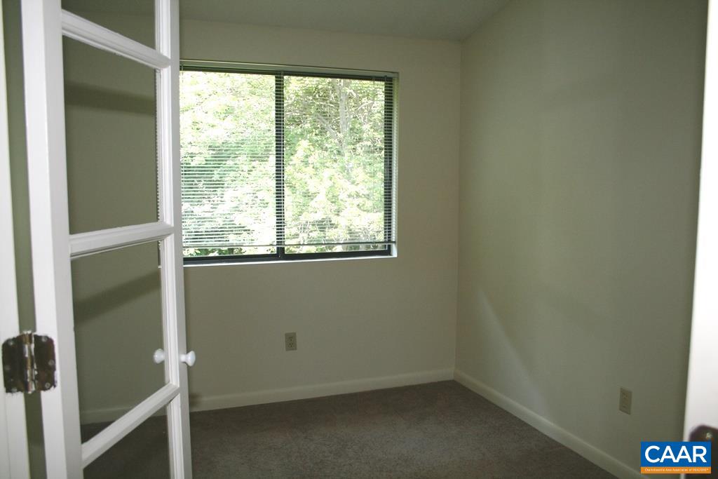 117 Turtle Creek Road, Unit 10 Charlottesville, VA 22901 - Photo 6 of 12 a view of a window in an empty room