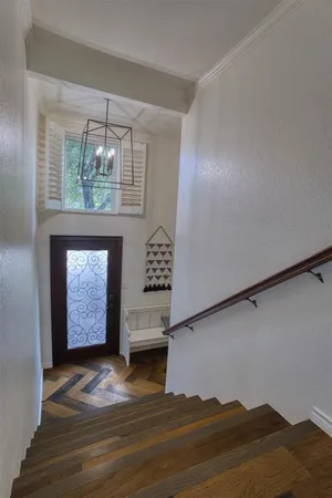 a view of an entryway with kitchen area