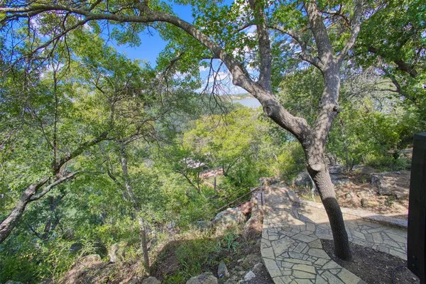 a backyard of a house with lots of green space