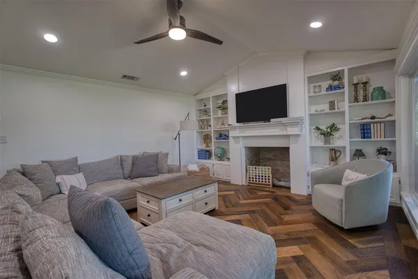 a living room with furniture or fireplace and a flat screen tv