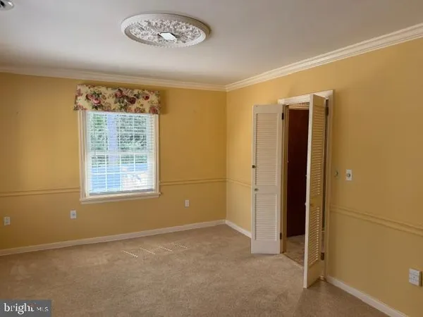 a utility room with a washer and a stove