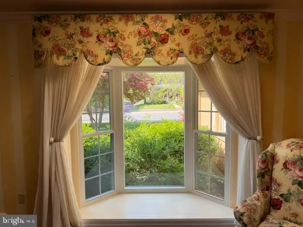 a view of a balcony with an outdoor space