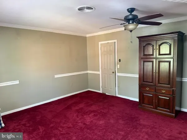 a bathroom with a sink and a window