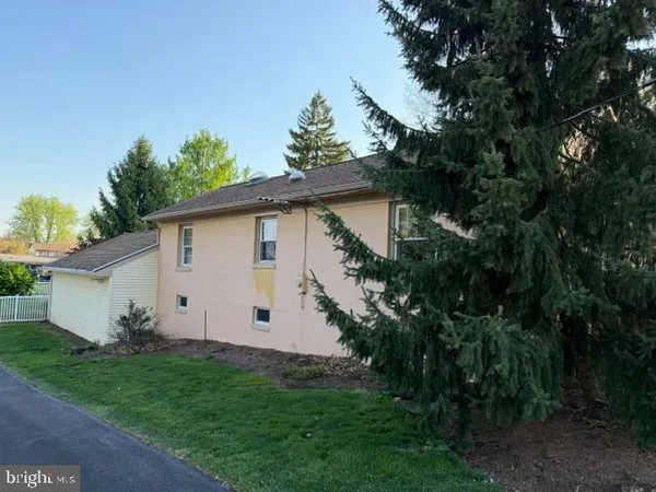 a view of house with outdoor space