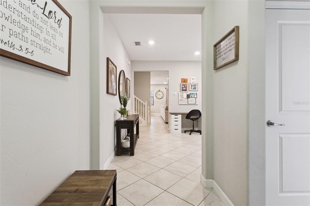 8816 Shady Pavillion Court Land O Lakes, FL 34637 - Photo 5 of 64 a hallway with furniture and a window