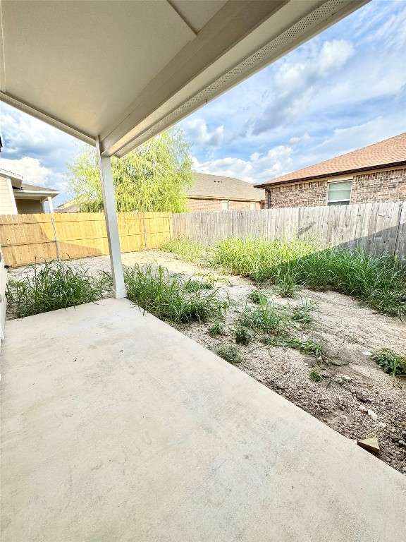 100 Zayd Court, Unit A Jarrell, TX 76537 - Photo 19 of 20 a view of a big yard with potted plants