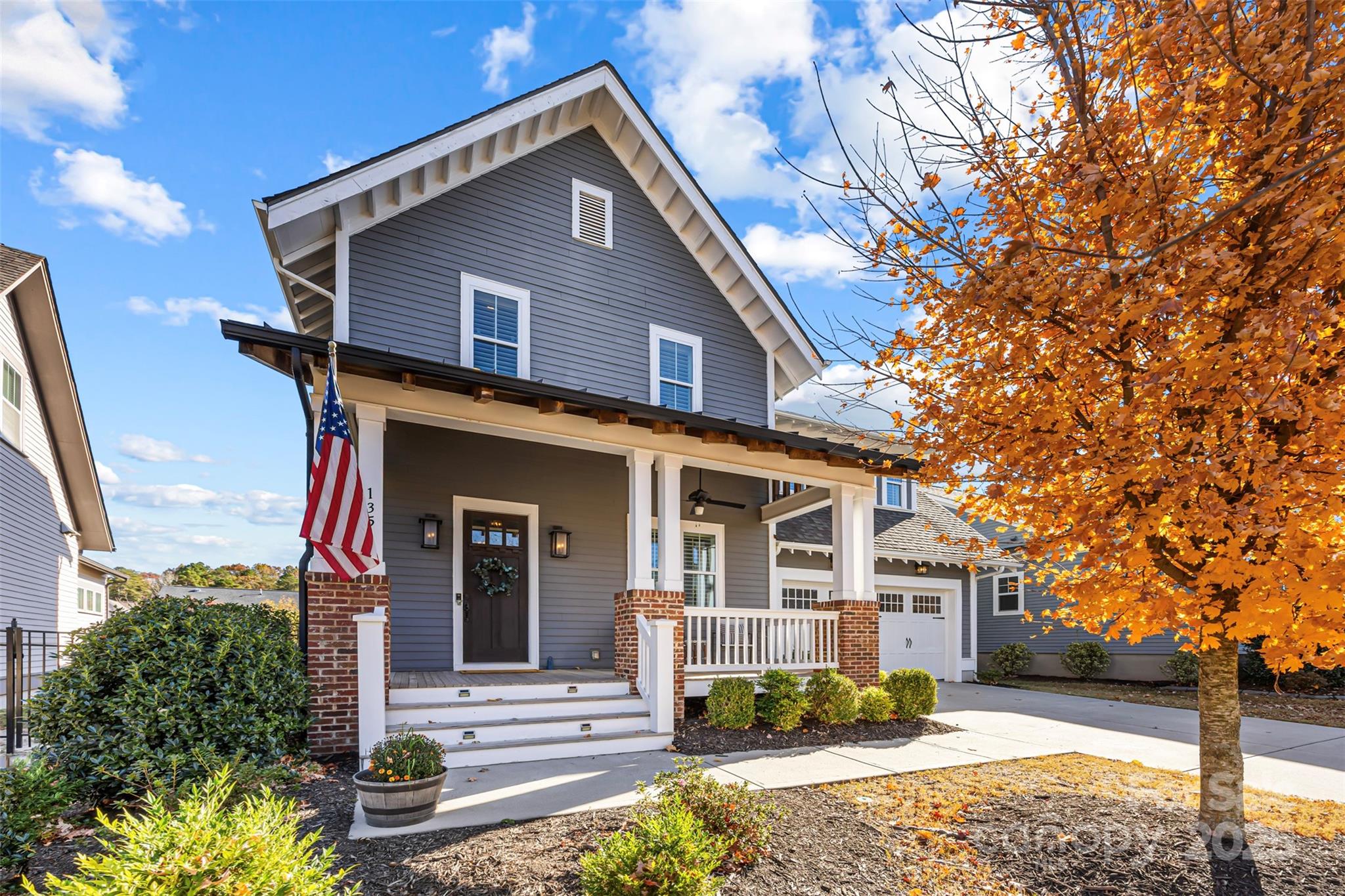 135 Inspired Way Fort Mill, SC 29708 - Photo 2 of 48 a front view of a house with a yard