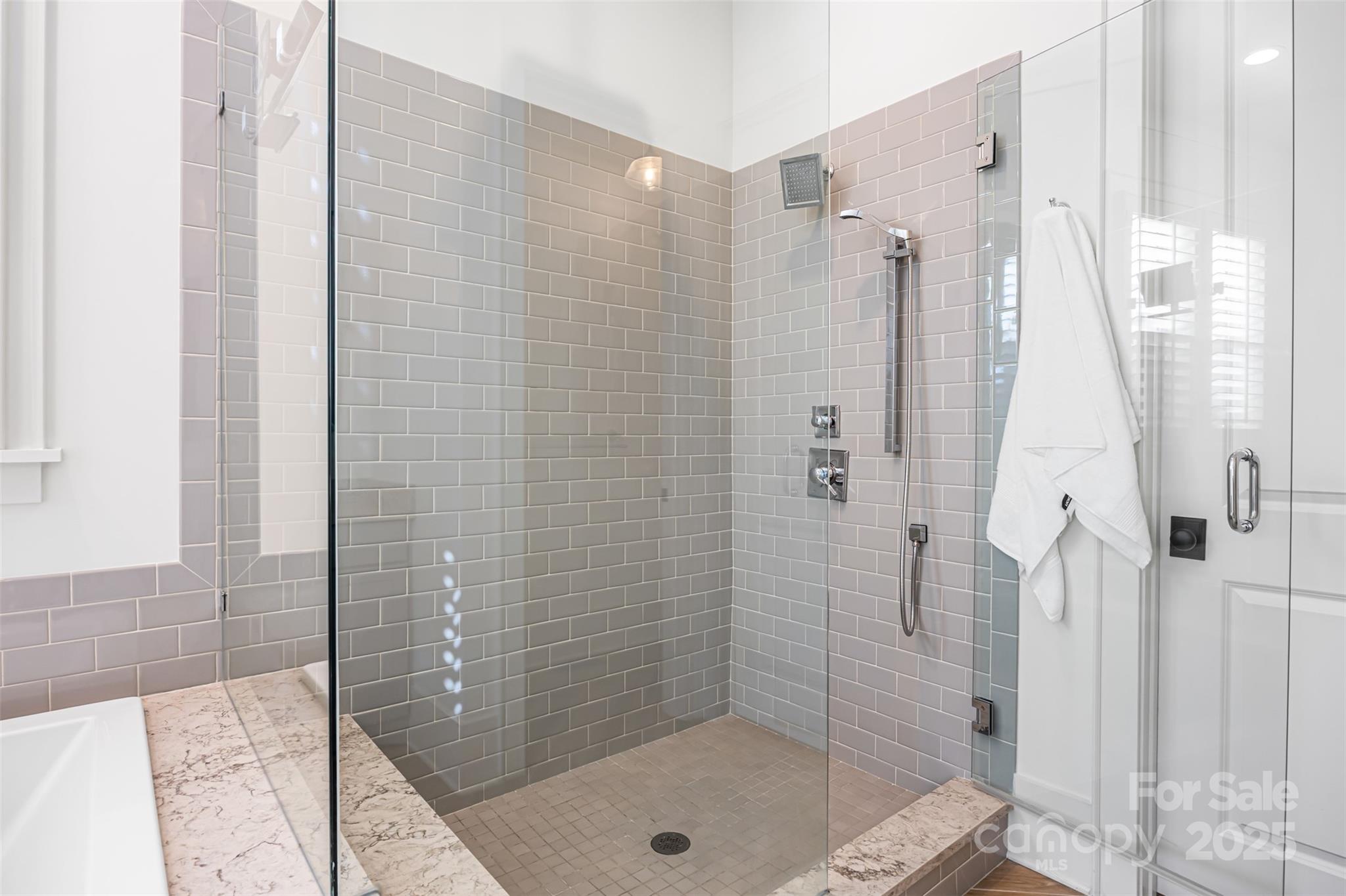 135 Inspired Way Fort Mill, SC 29708 - Photo 22 of 48 a bathroom with a shower