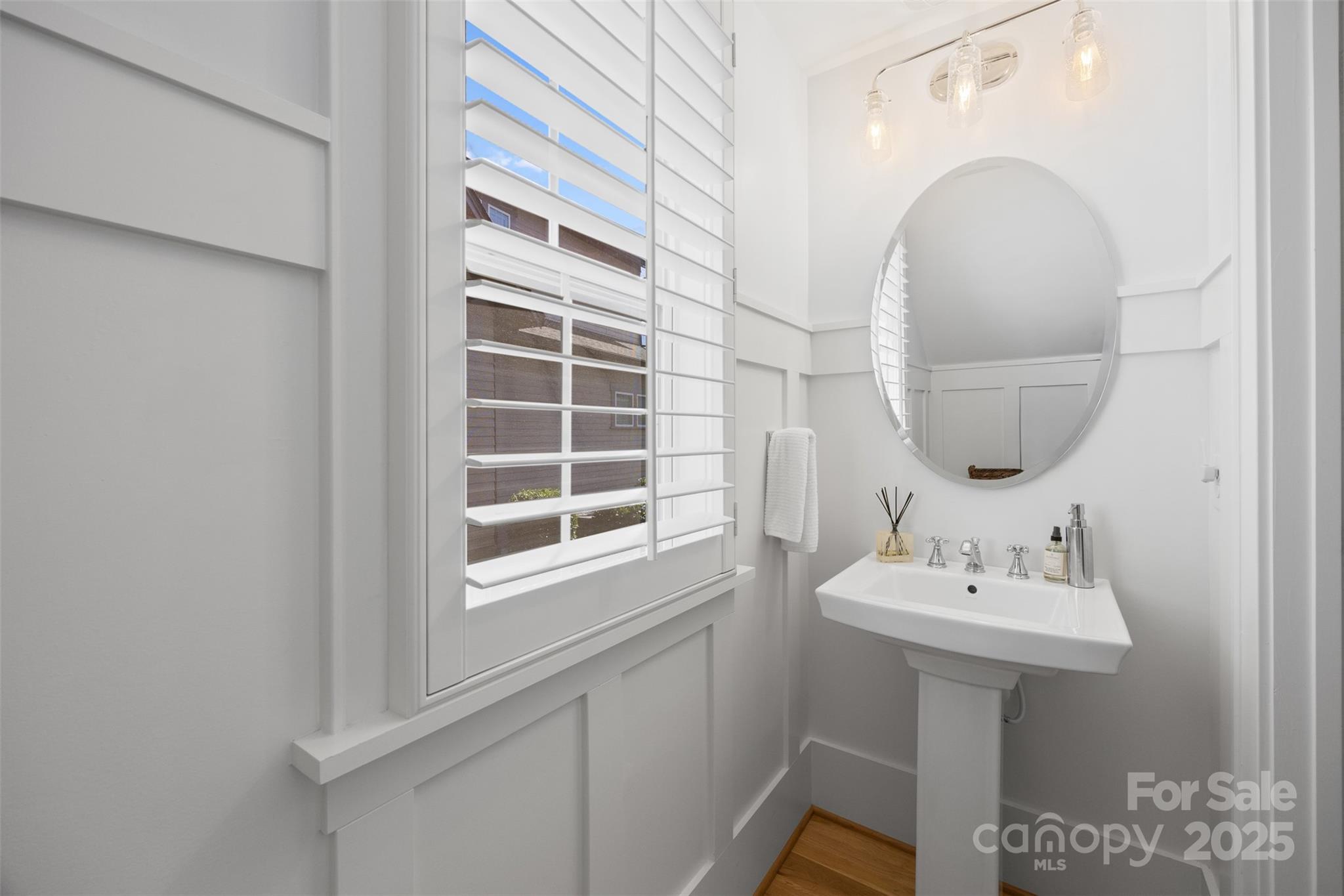 135 Inspired Way Fort Mill, SC 29708 - Photo 26 of 48 a bathroom with a sink and a mirror