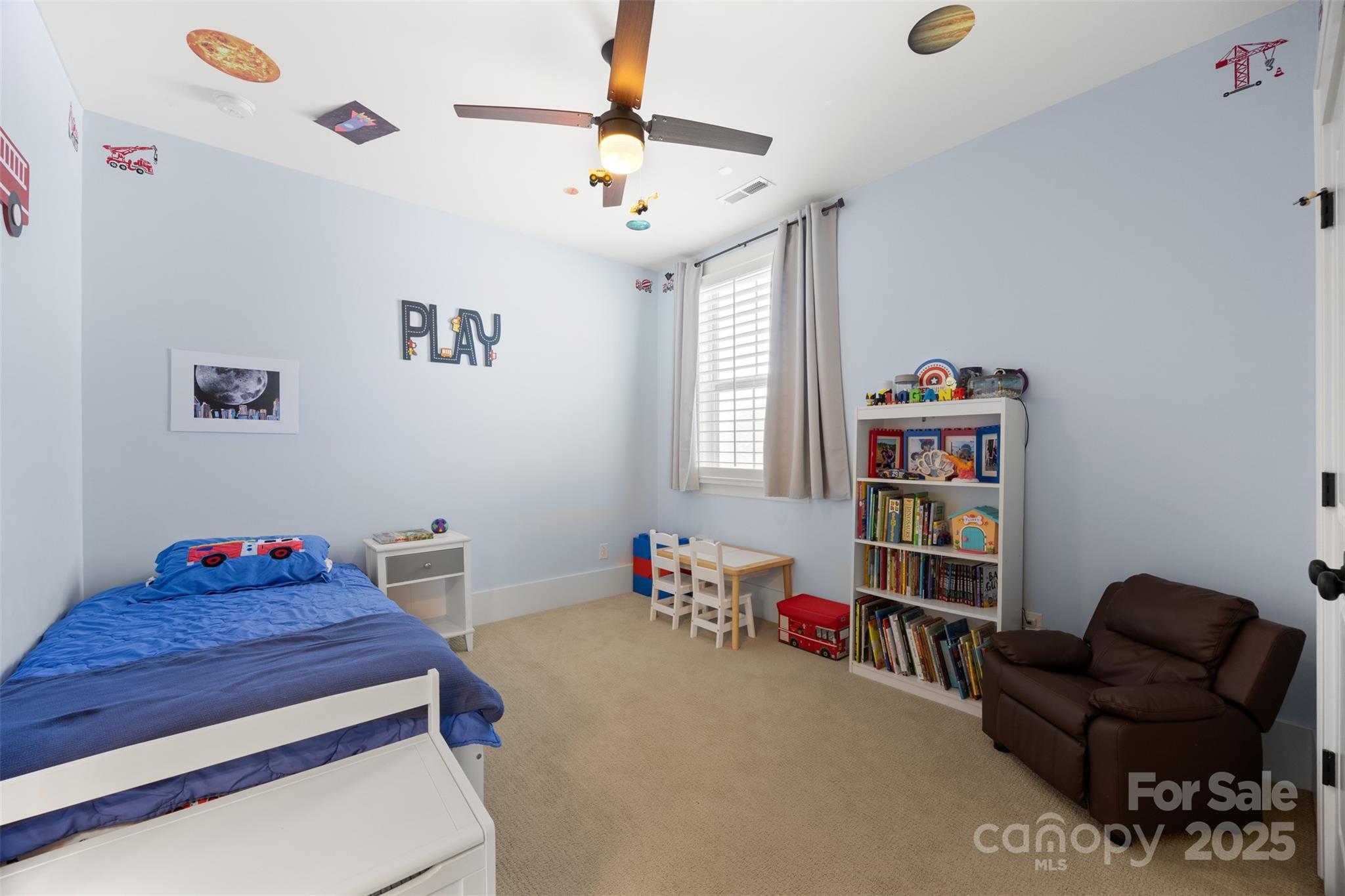 135 Inspired Way Fort Mill, SC 29708 - Photo 32 of 48 a room with furniture toys and a book shelf