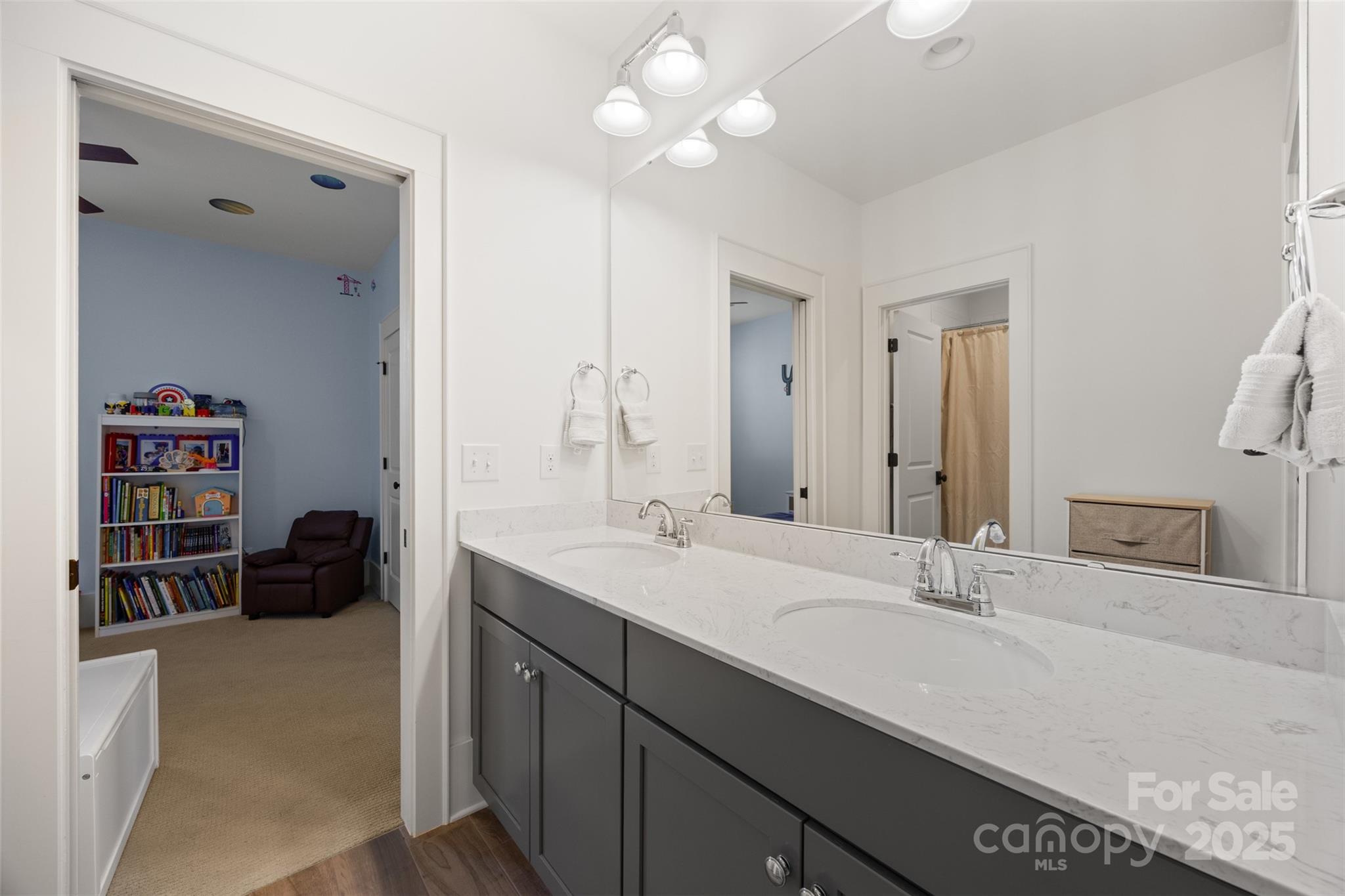 135 Inspired Way Fort Mill, SC 29708 - Photo 33 of 48 a bathroom with a sink double vanity and a mirror