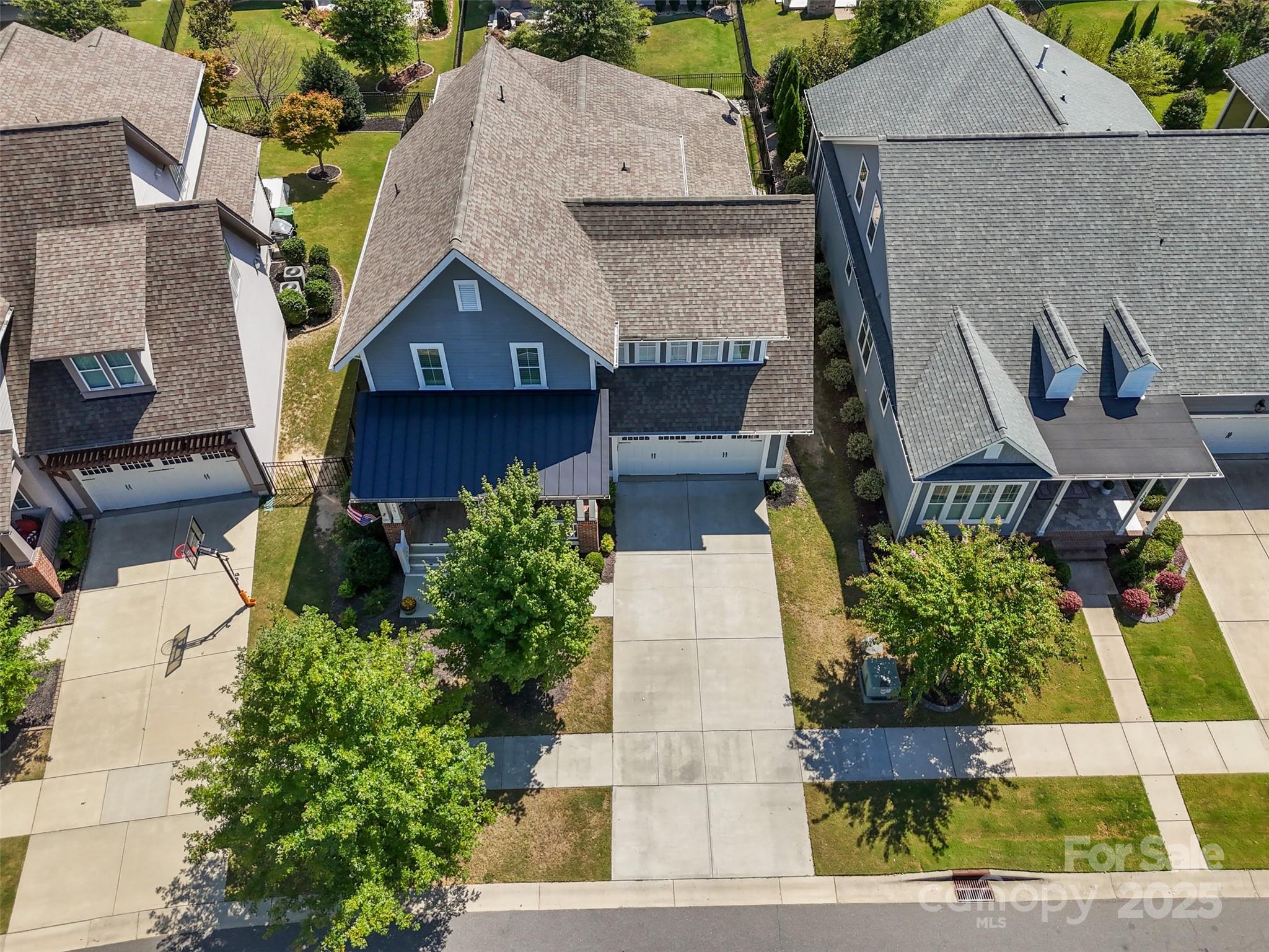 135 Inspired Way Fort Mill, SC 29708 - Photo 39 of 48 an aerial view of a house with a garden