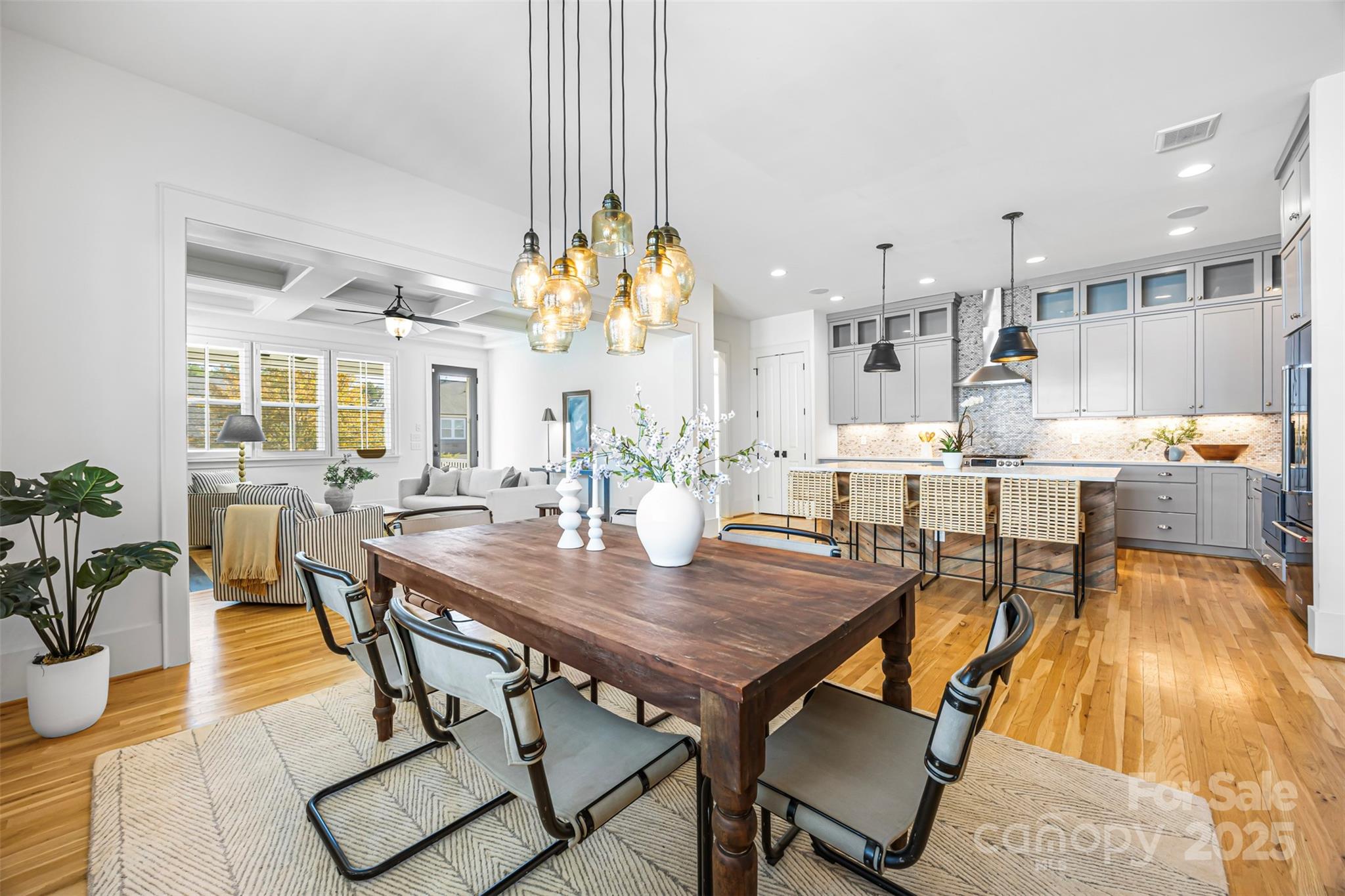 135 Inspired Way Fort Mill, SC 29708 - Photo 8 of 48 a view of a dining room with furniture and wooden floor