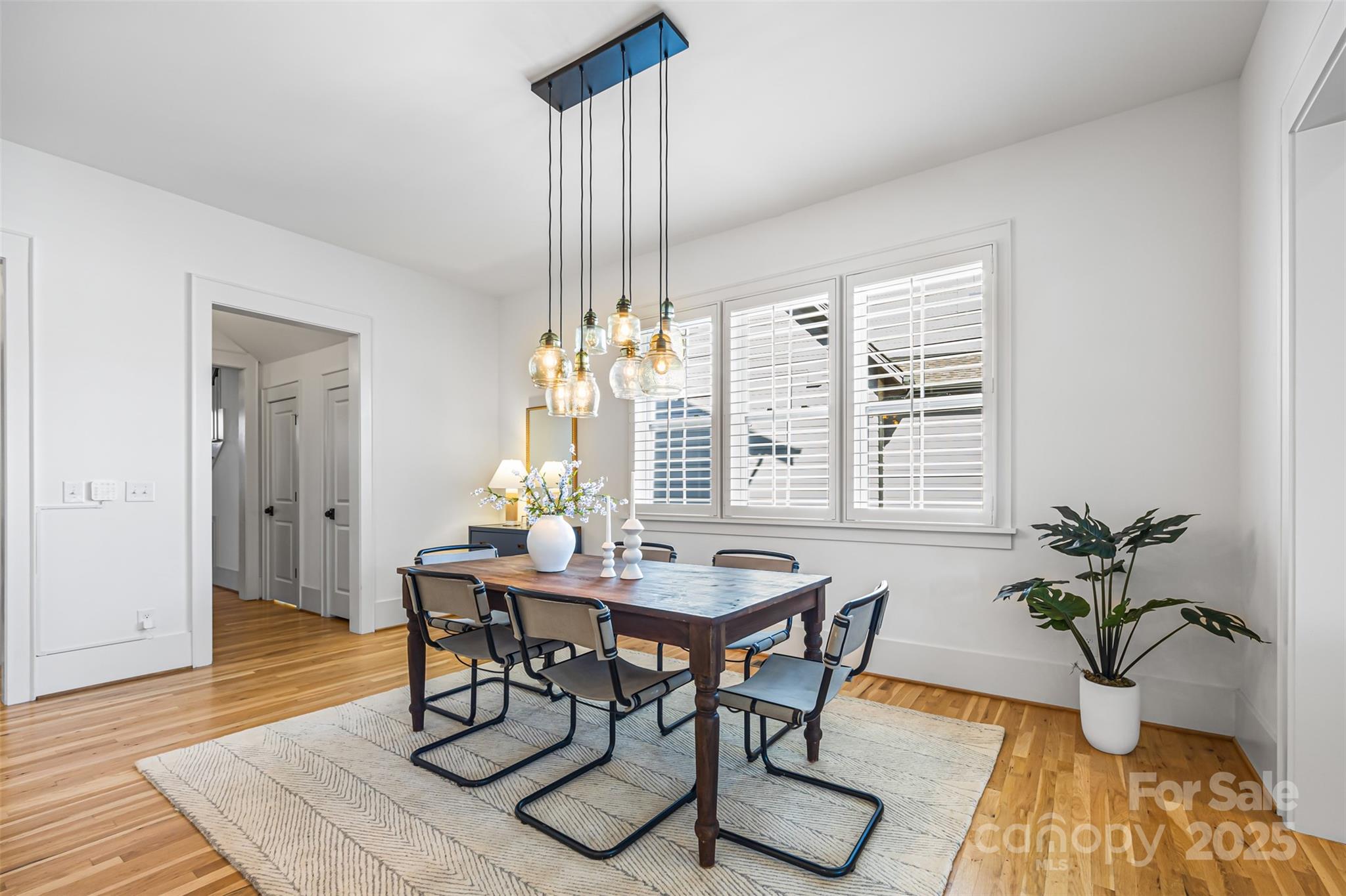 135 Inspired Way Fort Mill, SC 29708 - Photo 10 of 48 a view of a dining room with furniture window and wooden floor