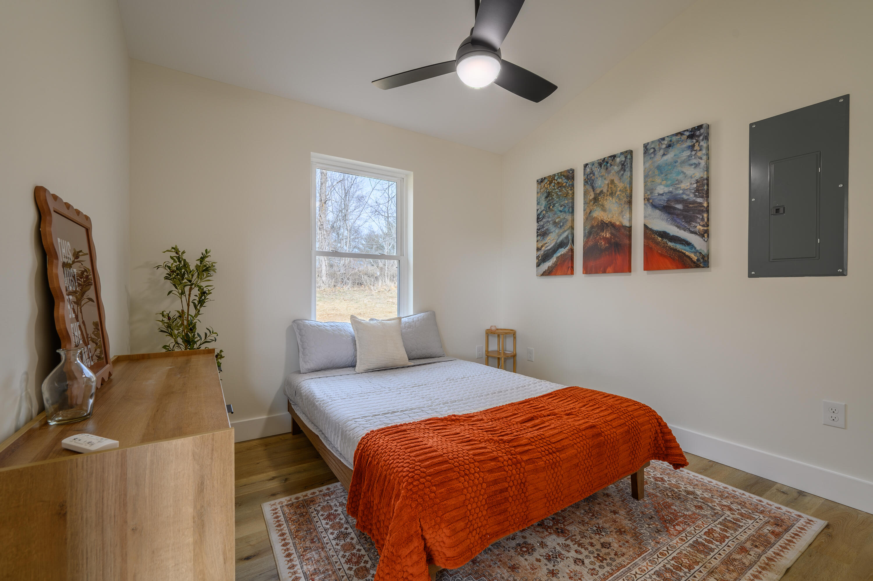 320 Grace Lane Northeast Riner, VA 24149 - Photo 15 of 33 a bedroom with a bed and wooden floor