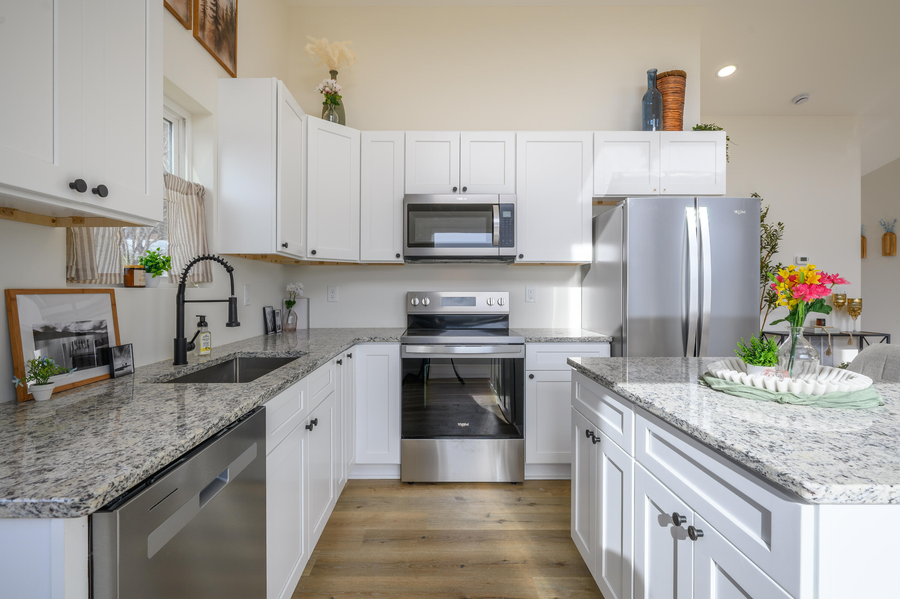 320 Grace Lane Northeast Riner, VA 24149 - Photo 26 of 33 a kitchen with granite countertop a sink stove and refrigerator