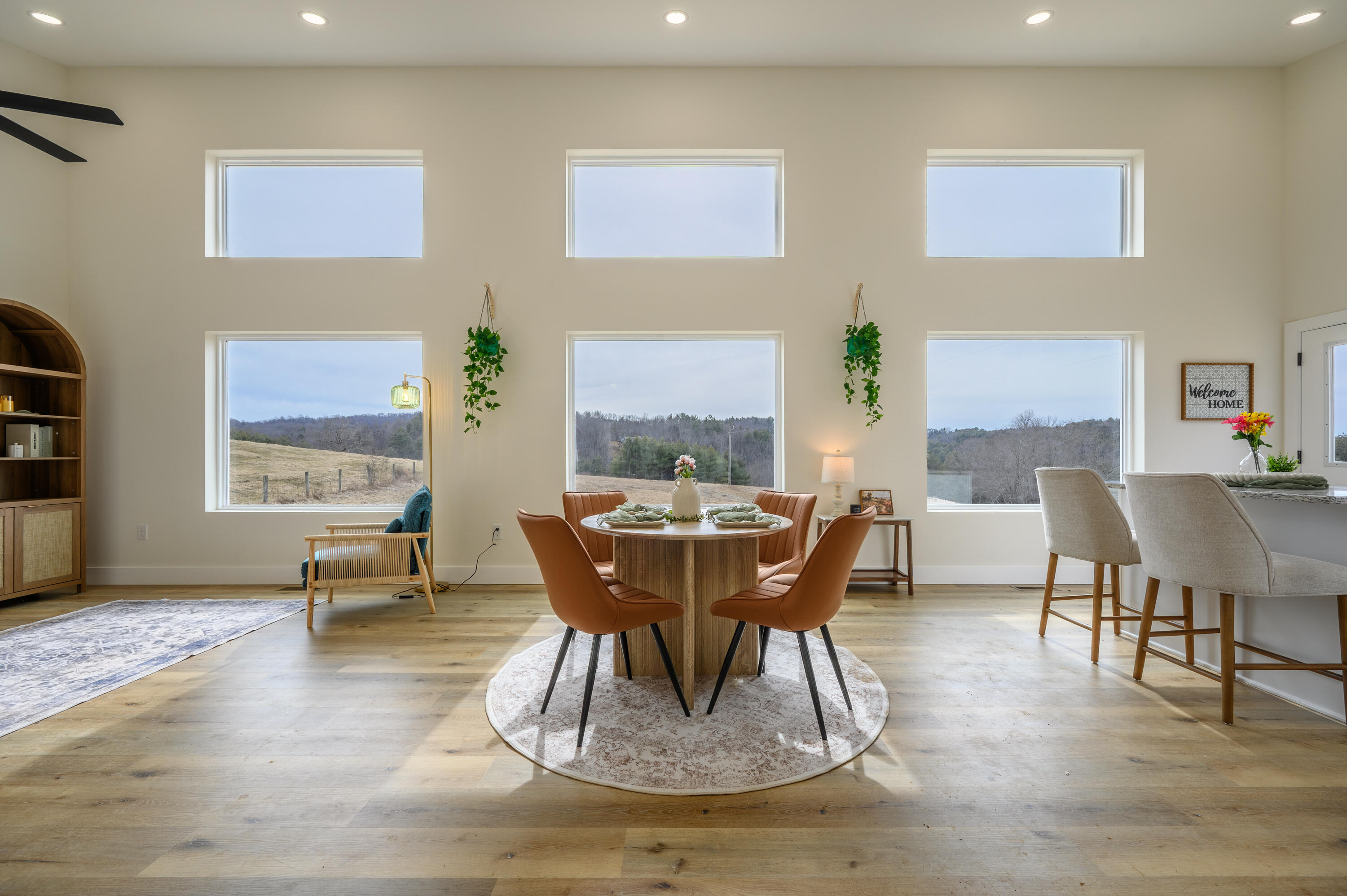 320 Grace Lane Northeast Riner, VA 24149 - Photo 7 of 33 a view of a dining room with furniture wooden floor and a rug