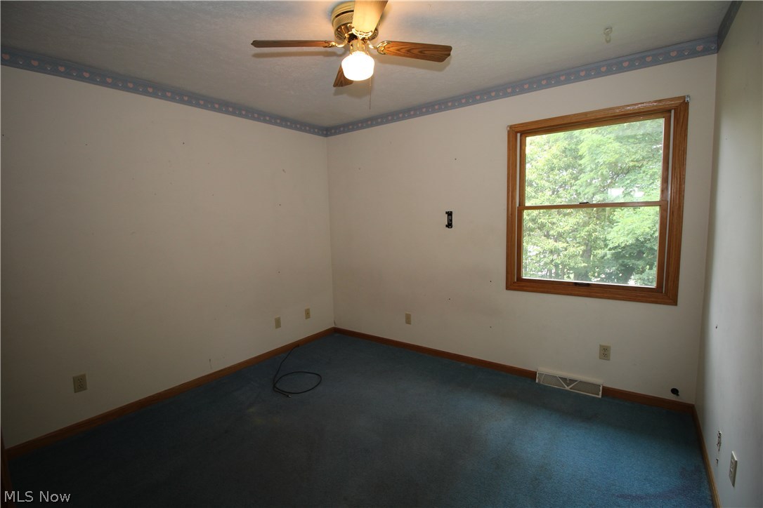 4534 Emma Place Northwest Canton, OH 44708 - Photo 9 of 15 Bedroom 2 - features ceiling fan and roomy closet