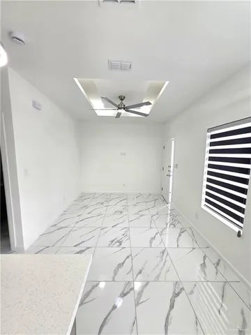 a view of a room with a window