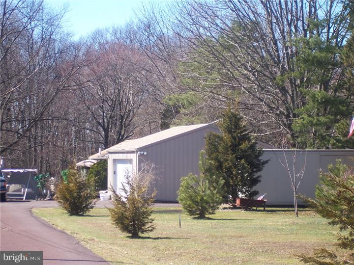 1024 Middle Road Perkasie, PA 18944 - Photo 1 of 14 a view of a garden with potted plants