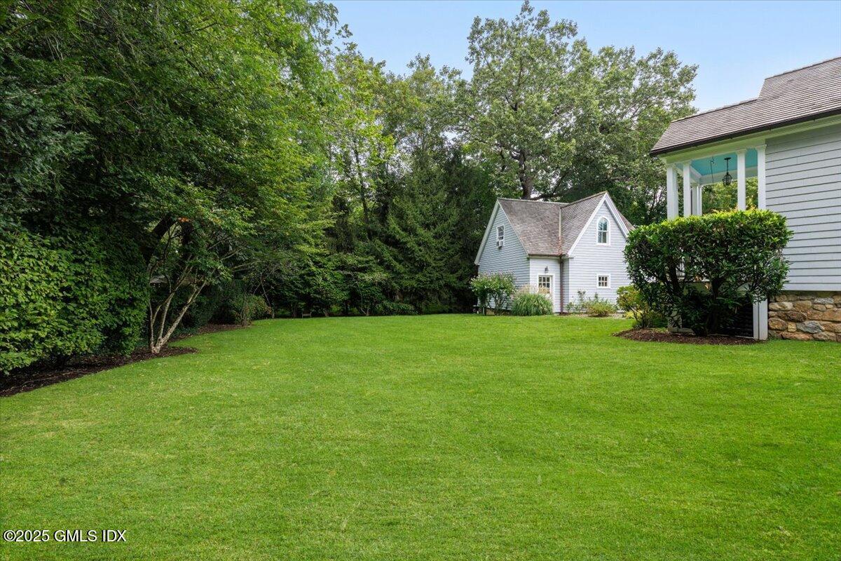 203 Riverside Avenue Riverside, CT 06878 - Photo 39 of 40 a view of a house with backyard and garden