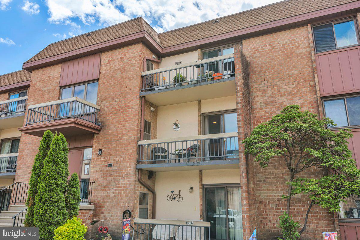 46202 Delaire Landing Road, Unit 202 Philadelphia, PA 19114 - Photo 1 of 34 a front view of a house with balcony