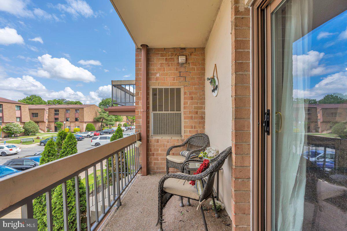 46202 Delaire Landing Road, Unit 202 Philadelphia, PA 19114 - Photo 14 of 34 a view of a balcony with chairs