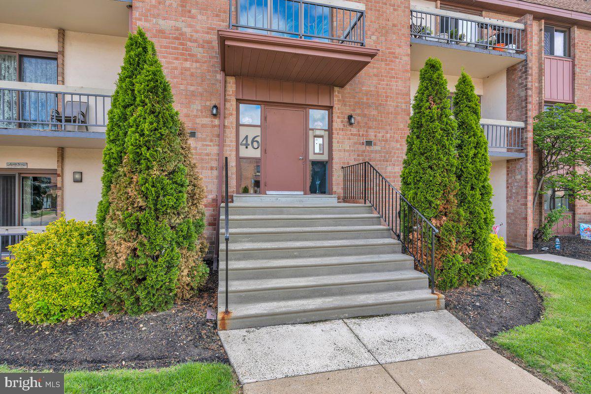 46202 Delaire Landing Road, Unit 202 Philadelphia, PA 19114 - Photo 2 of 34 a front view of a house