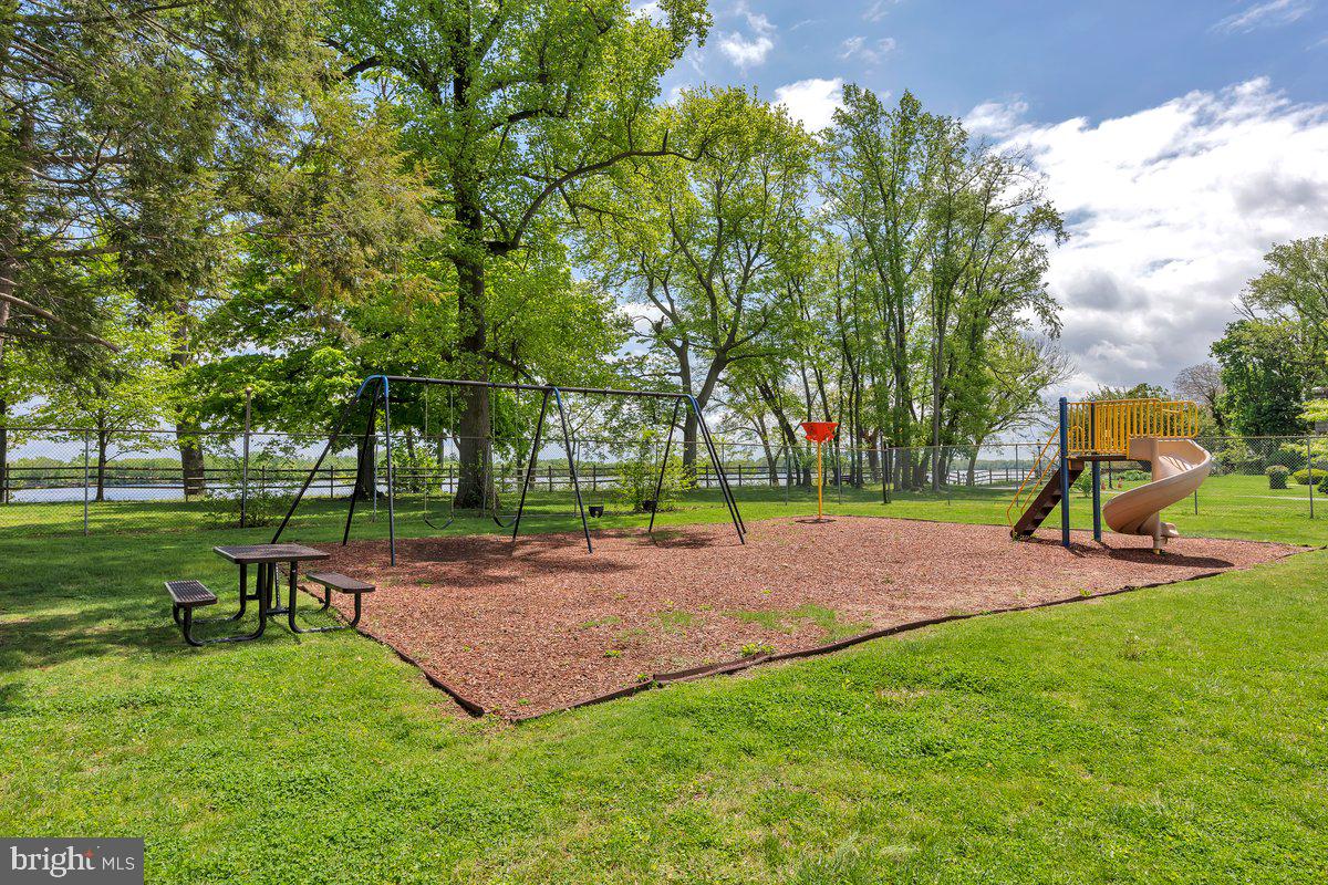 46202 Delaire Landing Road, Unit 202 Philadelphia, PA 19114 - Photo 28 of 34 a view of a park with large trees