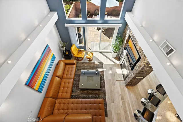 a bedroom with a bed and a flat tv screen