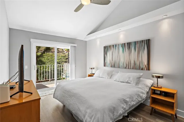 a bathroom with a granite countertop sink a mirror and a shower