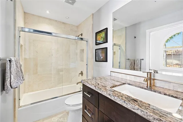 a view of a dry yard with wooden floor