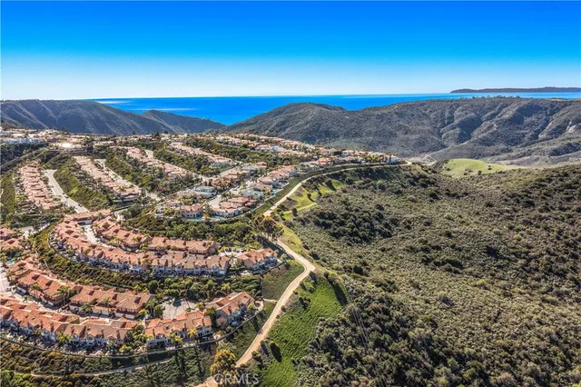 a view of a backyard of a house