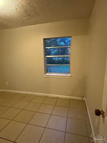 a view of a wall with an empty room