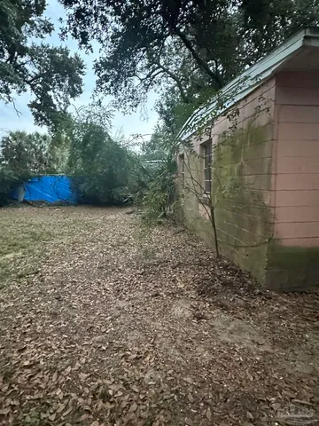 a view of a wooden fence