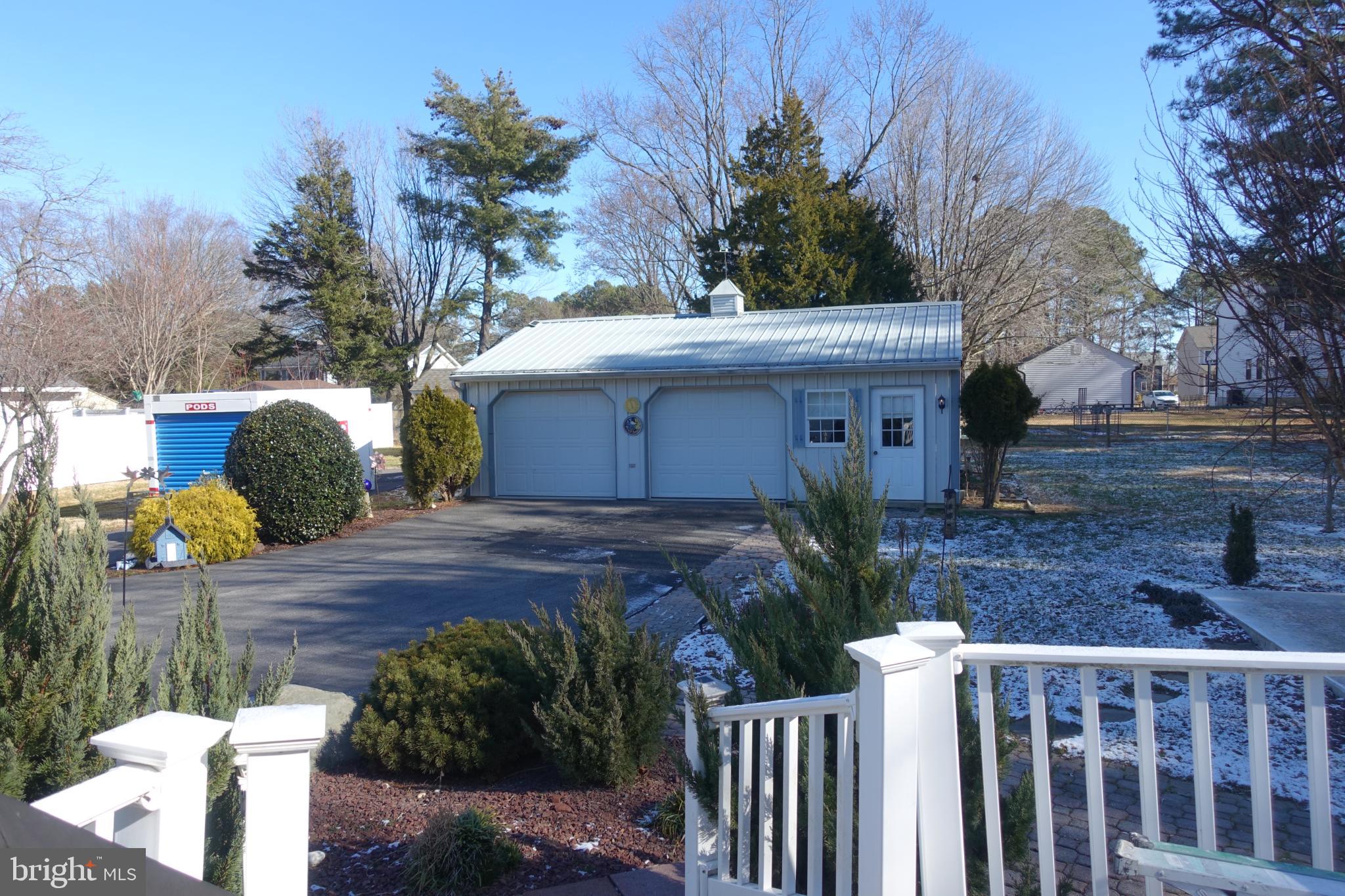 109 Carroll Road Stevensville, MD 21666 - Photo 4 of 9 Large 2 car detached garage with electric.