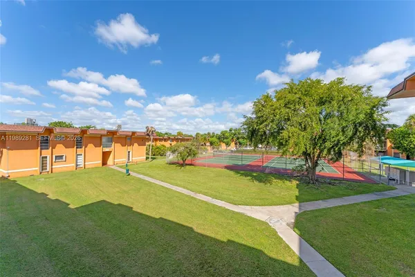 a view of a golf course with a lake