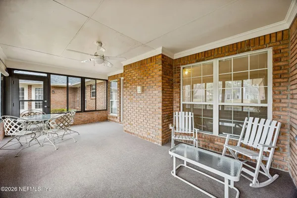 a view of a livingroom with furniture window and outside view