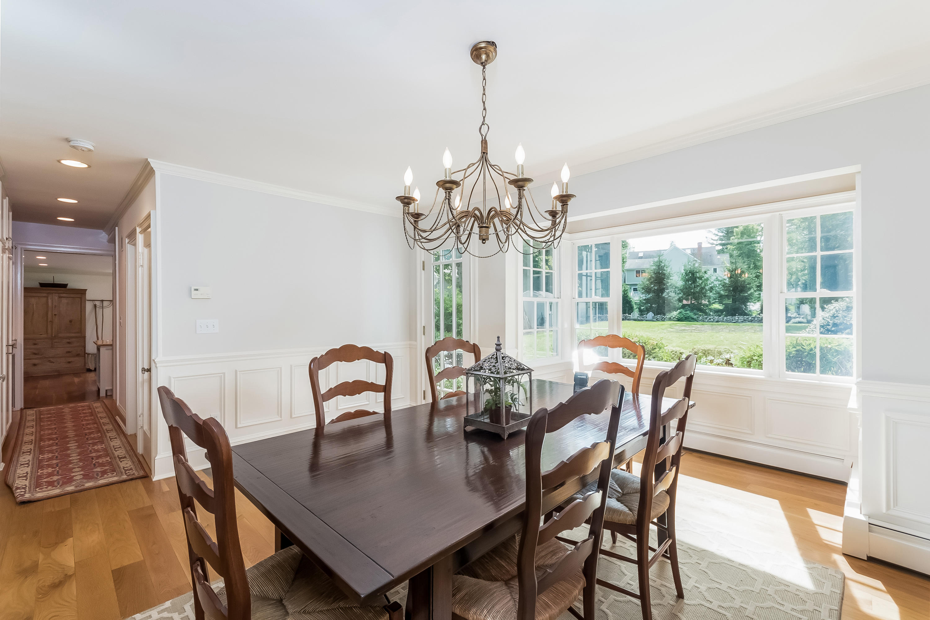 8 Laforge Road Darien, CT 06820 - Photo 11 of 34 a view of a dining room with furniture window and outside view