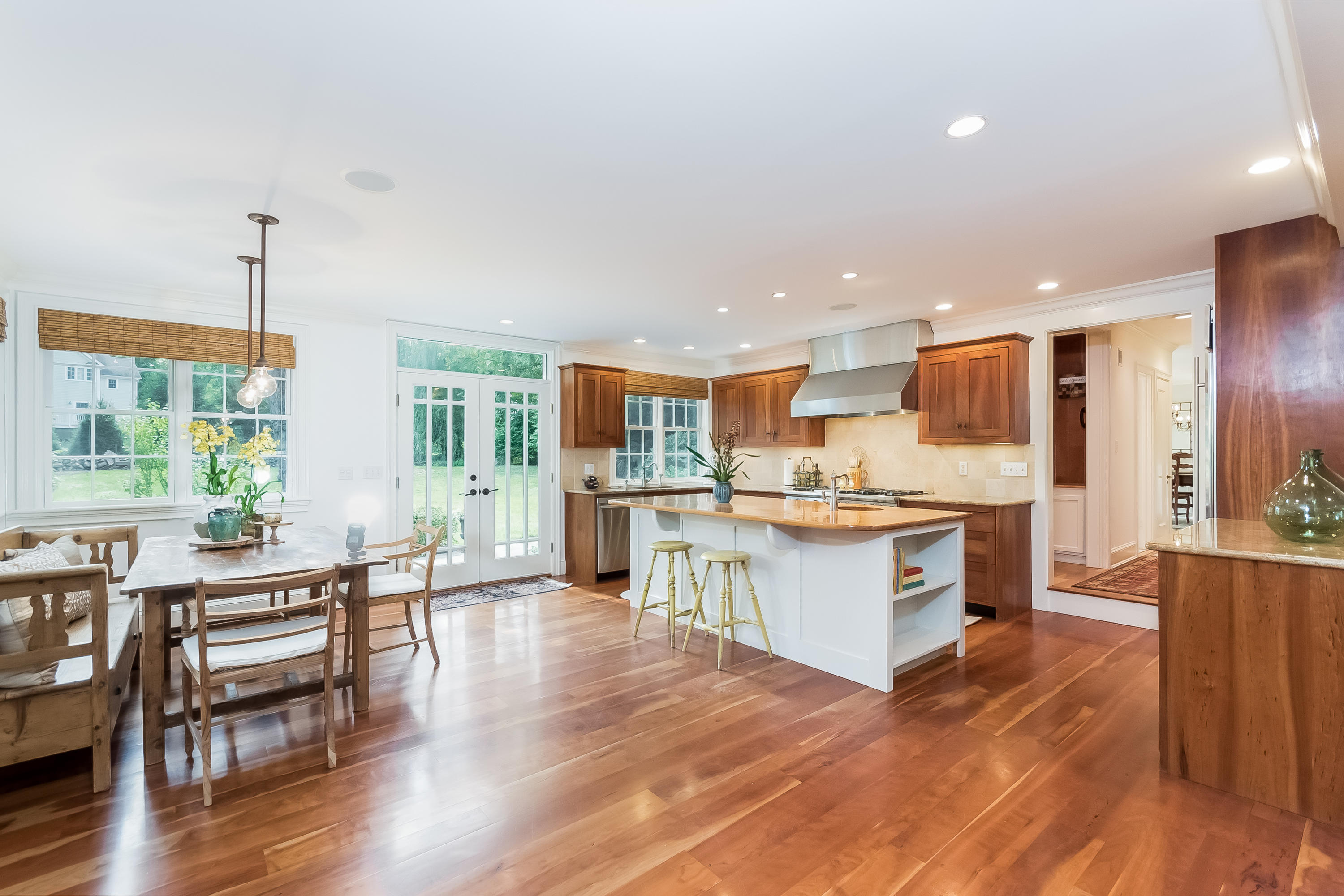 8 Laforge Road Darien, CT 06820 - Photo 12 of 34 a kitchen with a table and chairs in it