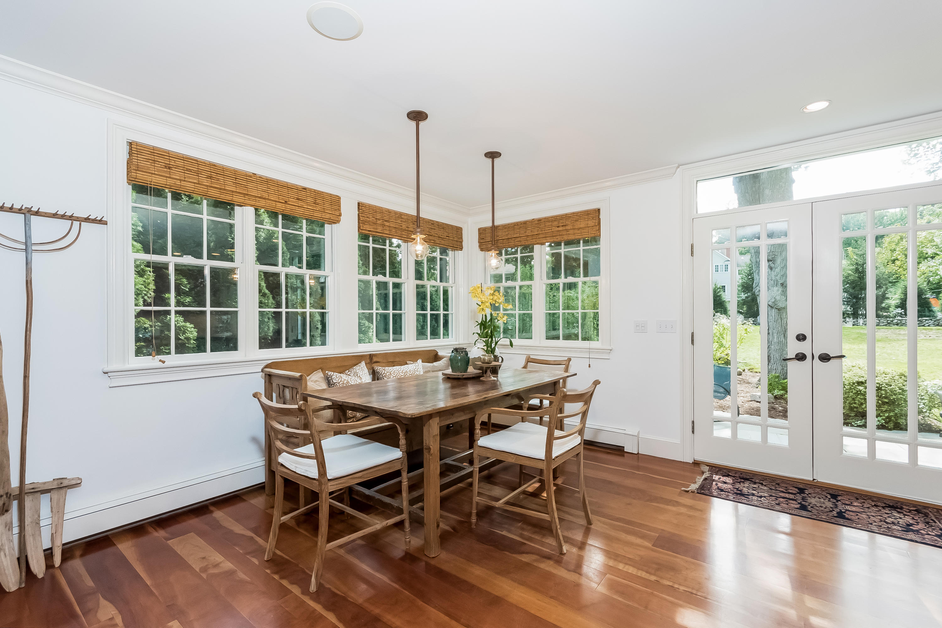 8 Laforge Road Darien, CT 06820 - Photo 13 of 34 a view of a dining room with furniture window and wooden floor